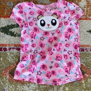A 365 Kids short sleeve shirt with a panda on it.